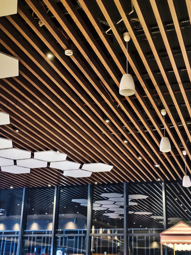 Factory Curved Modern Strip Aluminum Film Coated Suspended Baffle Ceiling Wood Grain Finish Fireproof Heat Insulation Class for