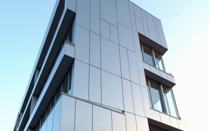 Engineering the Tray Aluminum Panel System for Drained Ventilated Facades and Long Term Weather Performance