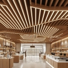 Factory Curved Modern Strip Aluminum Film Coated Suspended Baffle Ceiling Wood Grain Finish Fireproof Heat Insulation Class for