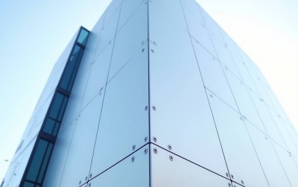 How Aluminum Alloy Tensile Strength Drives Solid Cladding Panel Specification and Wind Load Performance