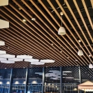 Factory Curved Modern Strip Aluminum Film Coated Suspended Baffle Ceiling Wood Grain Finish Fireproof Heat Insulation Class for